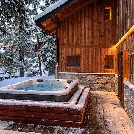 Neuf 7 – Jacuzzi Sauna – 12 à 14 Pers. Titania La Tania